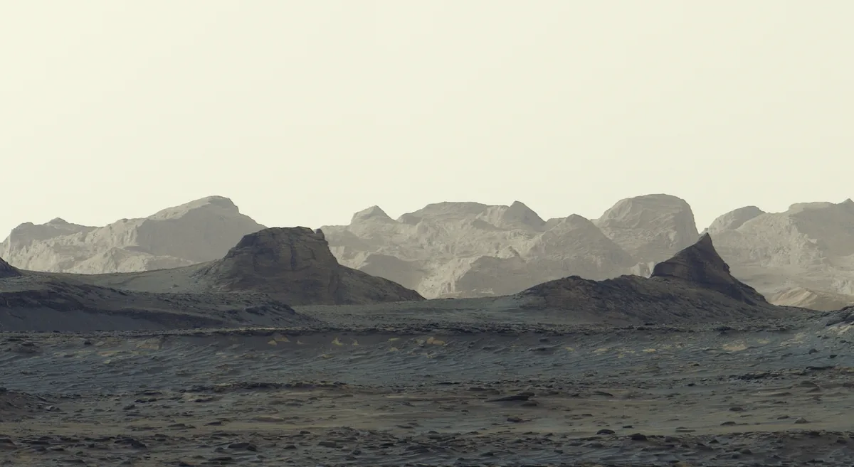 Kızıl Gezegen'in Şafağı: Curiosity Rüzgarın Oyduğu Kayaları Gözler Önüne Serdi